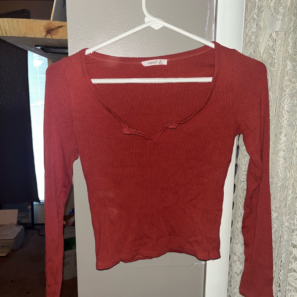 Long Sleeve, burnt orange, brand Timing, ribbed material. Size Medium never worn